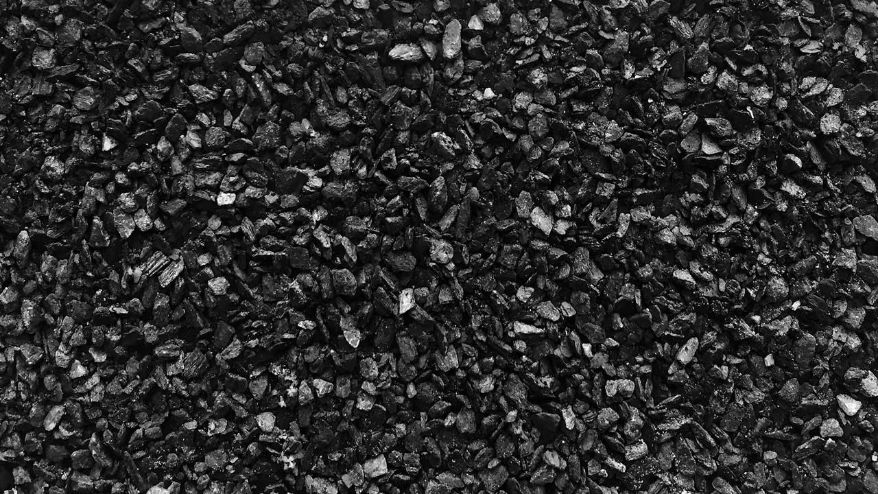 Pile of charcoal or activated carbon granules used in filtration