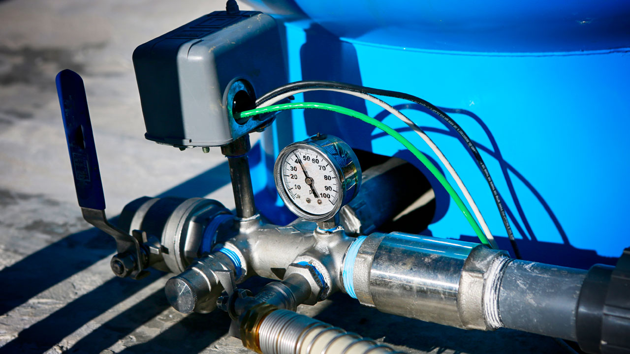 A pressure gauge on a well pressure tank showing in PSI (pounds per square inch) the water pressure in the system.