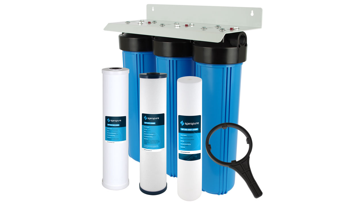 Example of whole-house water filter with three big blue filter housings on a metal mount with filter cartridges in front