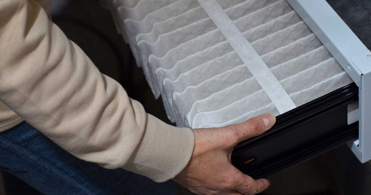 A whole house MERV 13 filter replacement and filter cabinet